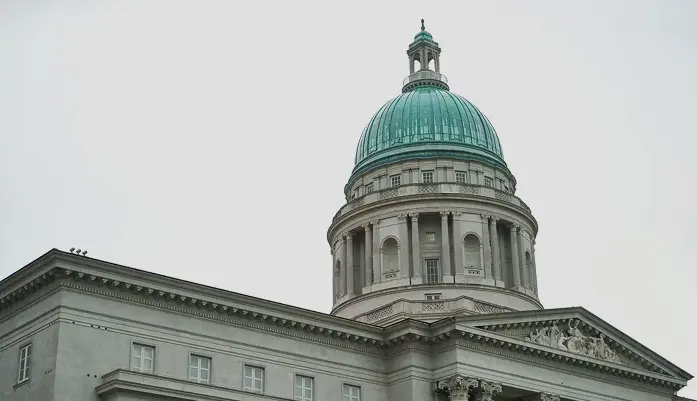 Historic building with a green copper dome
