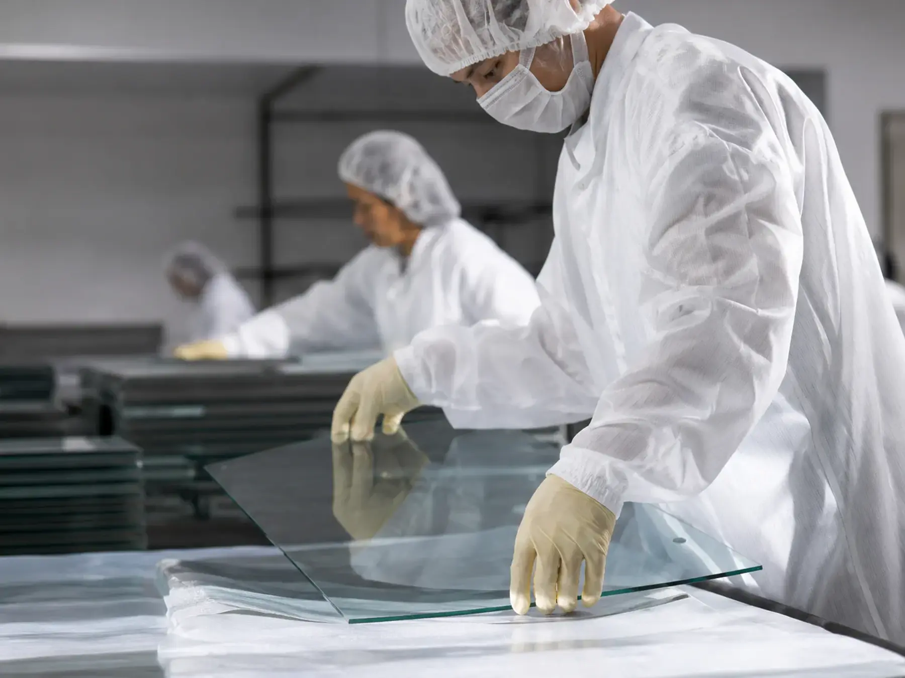 The ballistic glass with glazing film applying