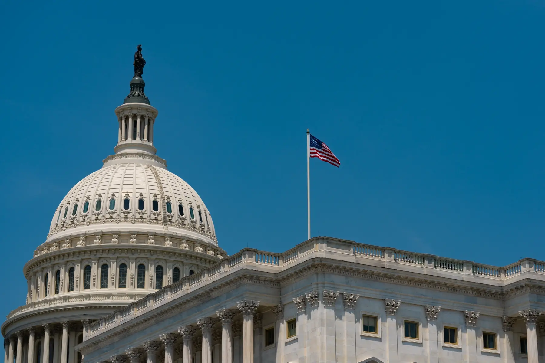 A beautiful government agency building with US flag in it
