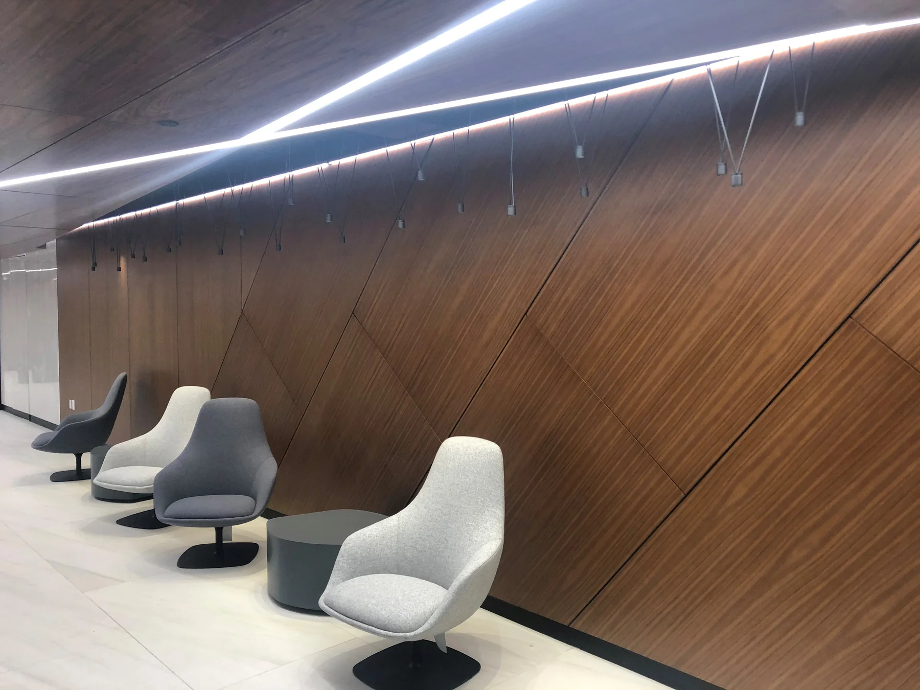 Wood Clad Ballistic Wall Panels installed on a corporate space