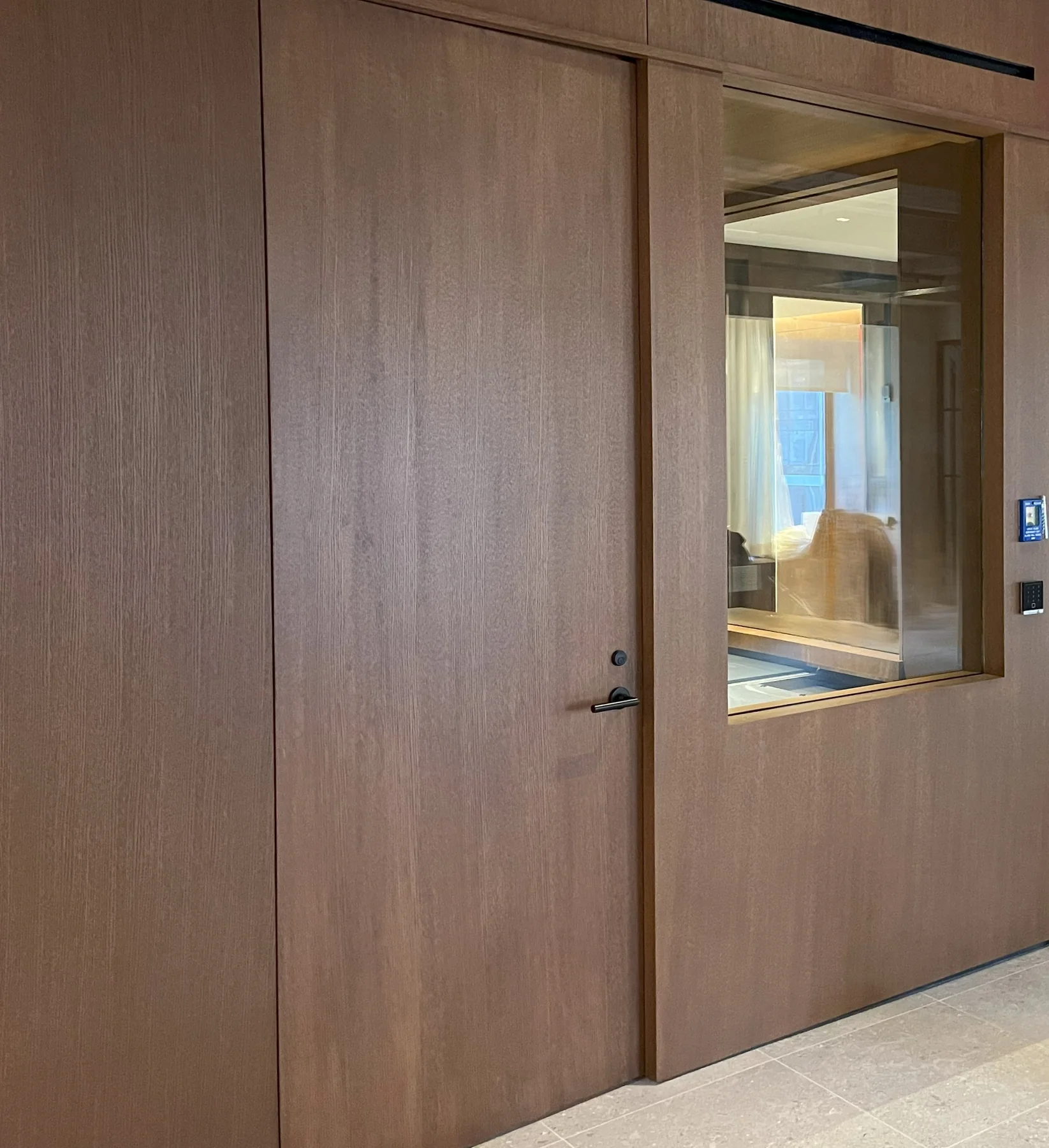 Wood Clad Ballistic Wall Panels installed on a corporate space